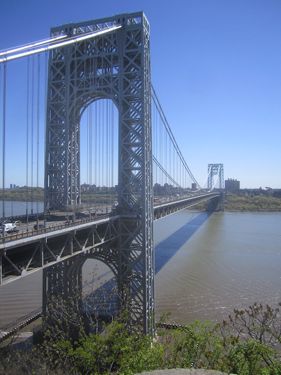 2013: George Washington Bridge.The world's busiest motor vehicle bridge, the George Washington Bridge (opened in 1931), links Manhattan to New Jersey at Fort Lee—roughly where the main thoroughfare, the Hackensack and Fort Lee Turnpike, if extended, would hit the "P" in "Palisades" on the map. The first view is taken from Fort Lee Historic Park, looking across the Hudson River to Manhattan. The other is from Hazard's Dock Boat Ramp underneath the bridge, showing the bridge entering New Jersey.