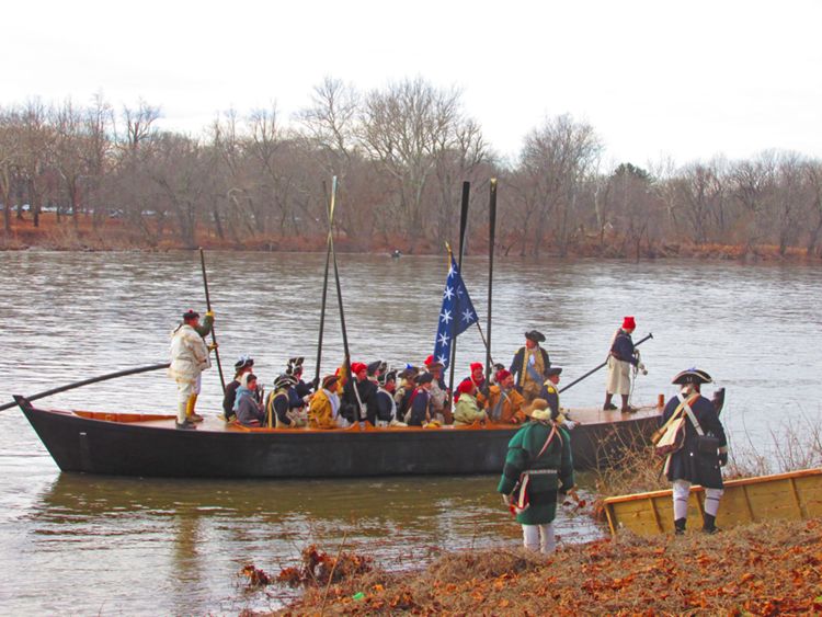 2013: Washington's Crossing. An annual reenactment of that crossing takes place each Christmas Day afternoon, weather permitting, attracting thousands of onlookers. In this photograph, General Washington (with the blue sash) successfully reaches the New Jersey shore on December 25, 2013.